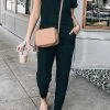 CUPSHE Davina Black One Shoulder Loose Jumpsuit